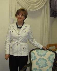 Judie Ricciardi, President and Owner of Put It Together, llc at her studio (chair fabric at Harmonyart.com)
